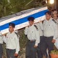 אילת מרכינה ראש