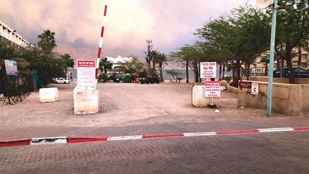 מי אישר הפעלת חניון פרטי בתשלום על החוף הצפוני?